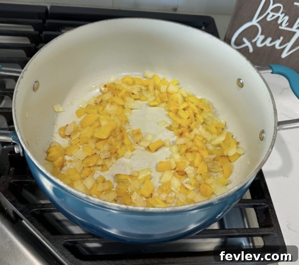 Sautéing onions and bell peppers for the taco skillet