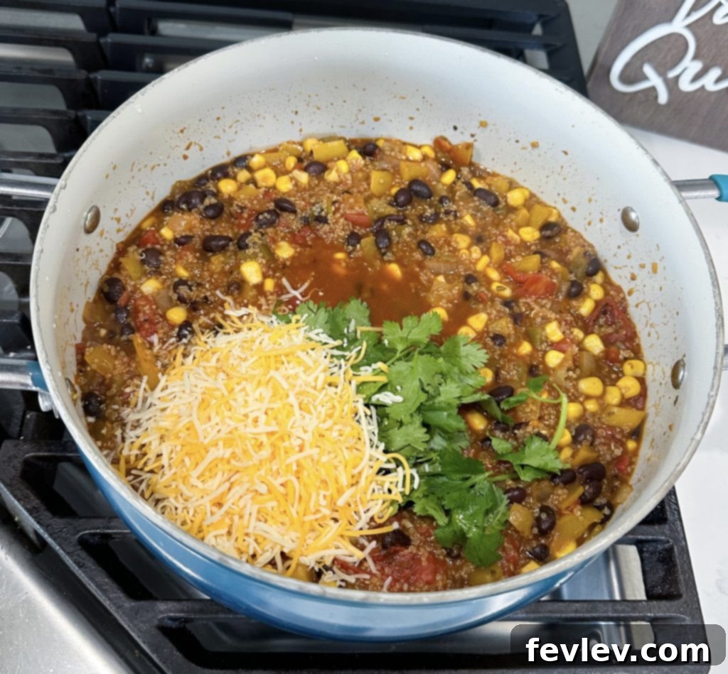 Finished meatless taco skillet topped with cheese and cilantro
