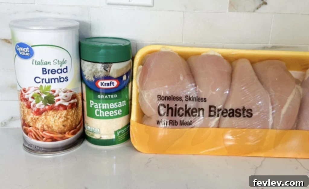 All the simple ingredients laid out to make delicious baked parmesan panko chicken.