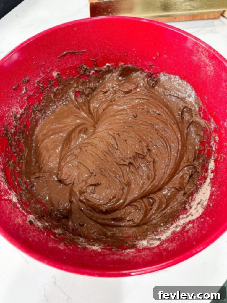 Ultimate Decadence Cake 3 Preparing the baking dish for Better Than Anything Cake