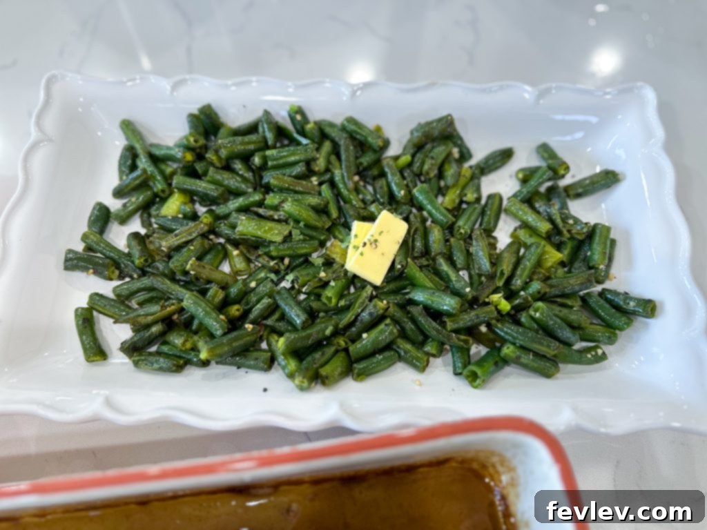 Your Festive Feast for Under Twenty Dollars 2 Close-up of freshly seasoned green beans in a pan.