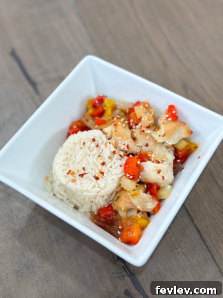 Tropical Sheet Pan Chicken Dinner 5 Cooked Easy Sheet Pan Hawaiian Chicken, ready to serve.