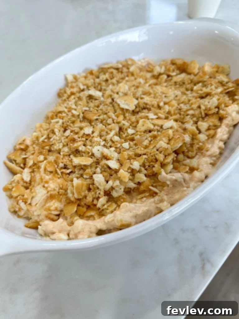 million dollar chicken casserole topped with buttery cracker crumbs
