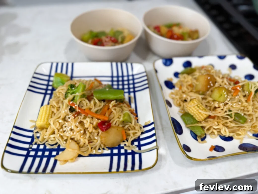 Feast for a Month: $45 Budget Dinners and Savvy Grocery Secrets 7 A vibrant ramen stir-fry with colorful vegetables and noodles, showcasing a budget-friendly meal.