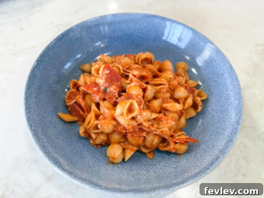 Feast for a Month: $45 Budget Dinners and Savvy Grocery Secrets 8 A cheesy, pepperoni-filled pizza pasta dish, combining two beloved comfort foods into one affordable meal.