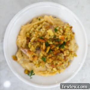 Crunchy No-Peek Cheesy Chicken casserole ready to serve in a dish