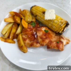 Easy sheet pan BBQ chicken with corn and potato wedges