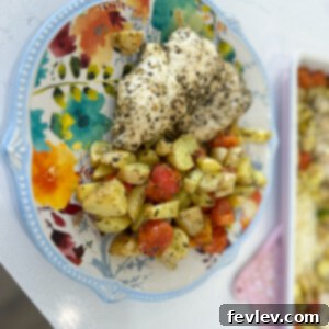 Sheet pan pesto chicken with cherry tomatoes and green beans