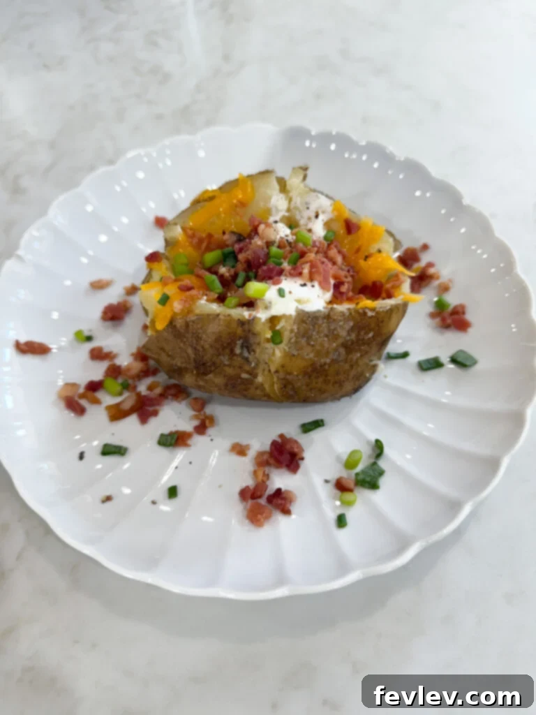 loaded baked potato cooked in the slow cooker, ready for toppings