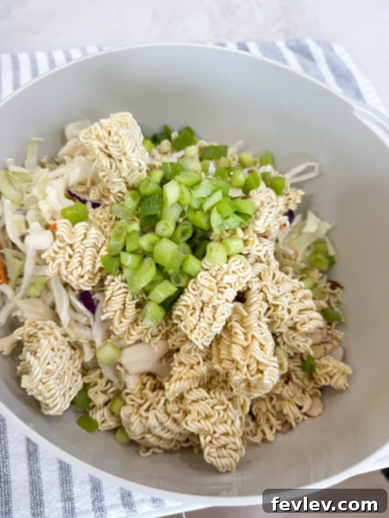Zesty Ramen Noodle Salad 8 add the ramen ingredients to the bowl