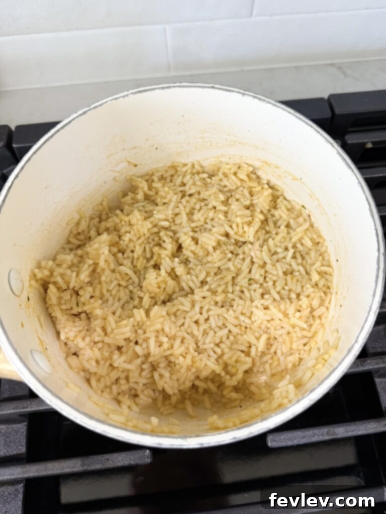 Cook rice for one-pan chicken and veggie rice