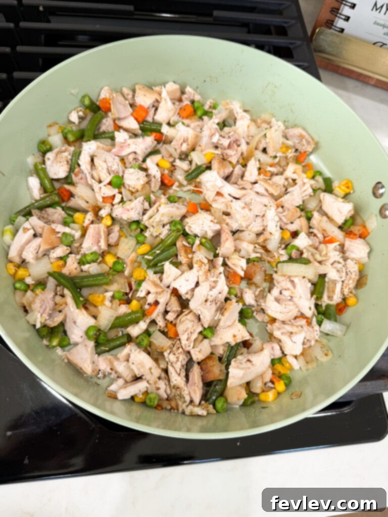 Saute chicken and veggies for dinner