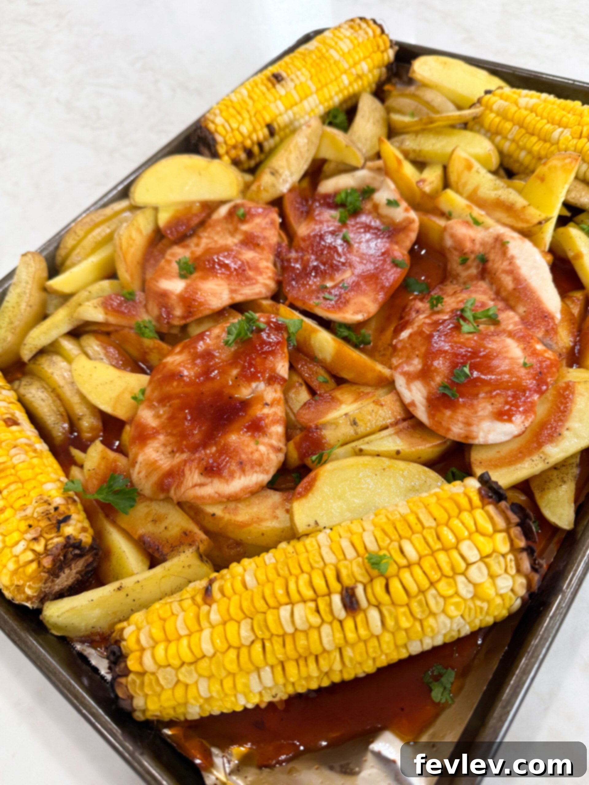 Sheet Pan BBQ Chicken with Corn and Potato Wedges