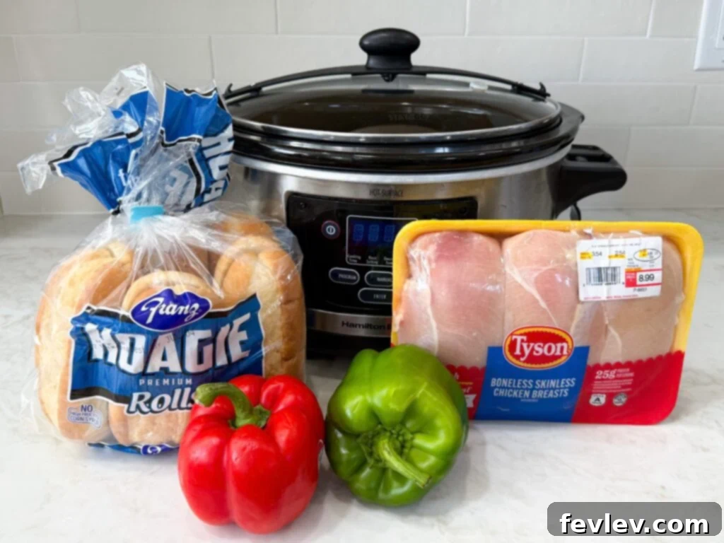Crockpot Chicken Philly Cheesesteak Sandwiches Ingredients on a cutting board