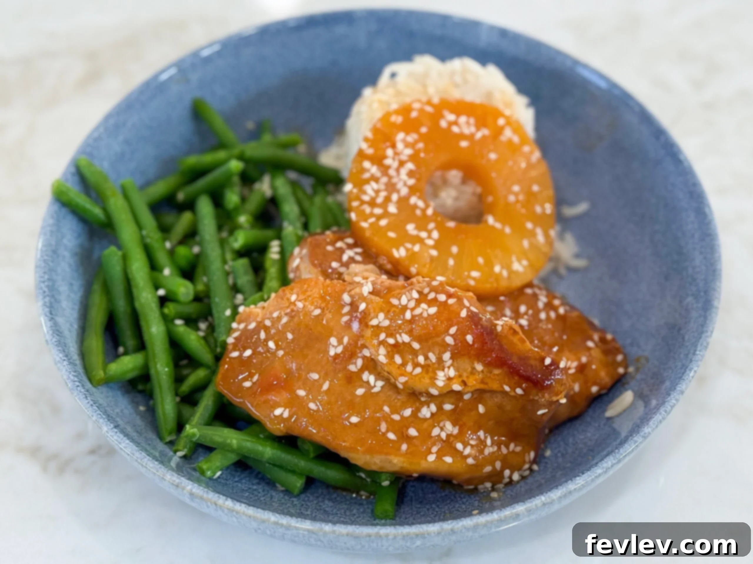 The Best Slow Cooker Hawaiian Pork Chops, juicy and tangy