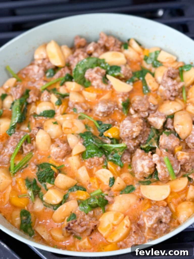 Easy sausage dinner recipe with spinach and Parmesan