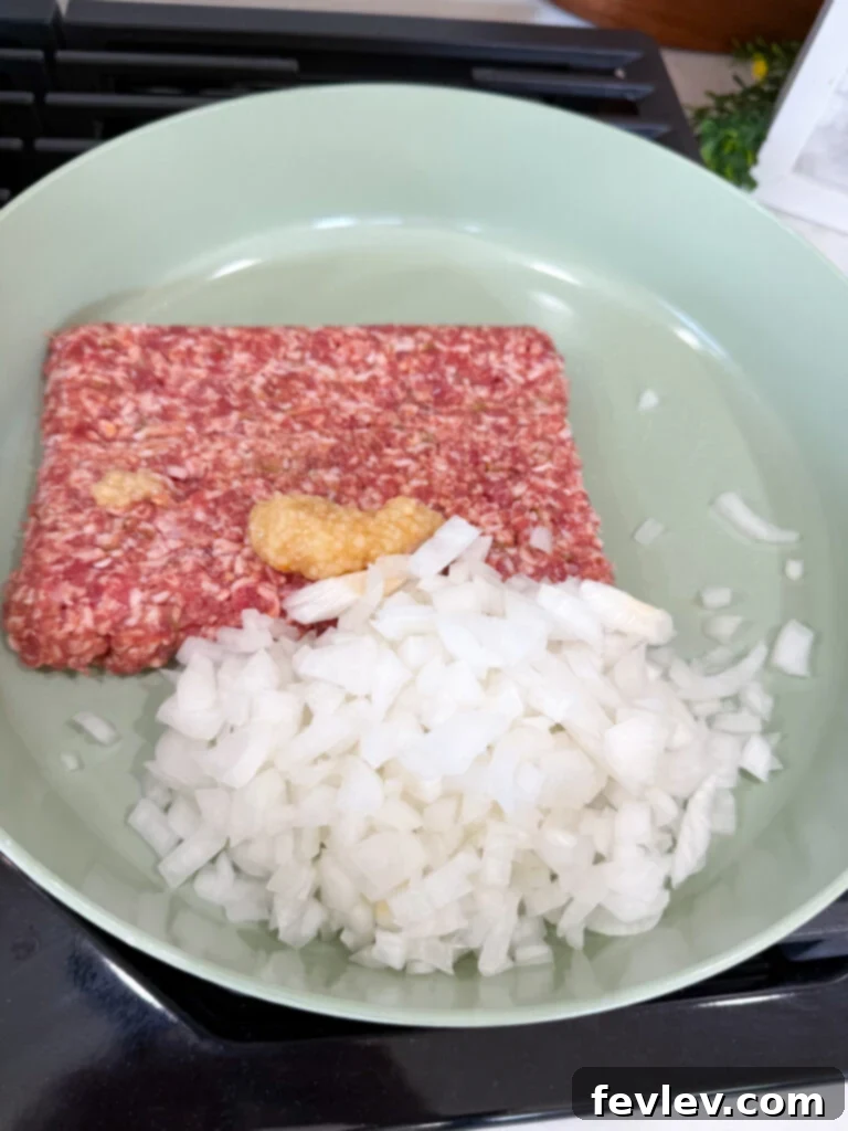 Cooking ground Italian sausage with onions and garlic