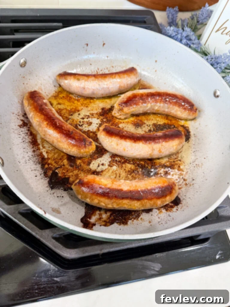 Easy One-Pan Sausage and Peppers 5 Cook sausages until browned on all sides in a large pan.