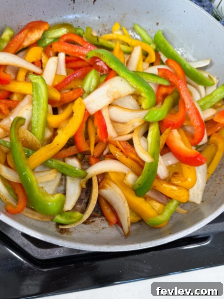 Easy One-Pan Sausage and Peppers 7 Saute peppers and onions in the same pan used for sausages.