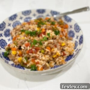 Ground Turkey and Rice Skillet, a quick, healthy, and satisfying dinner made effortlessly in one pan, full of everyday ingredients.