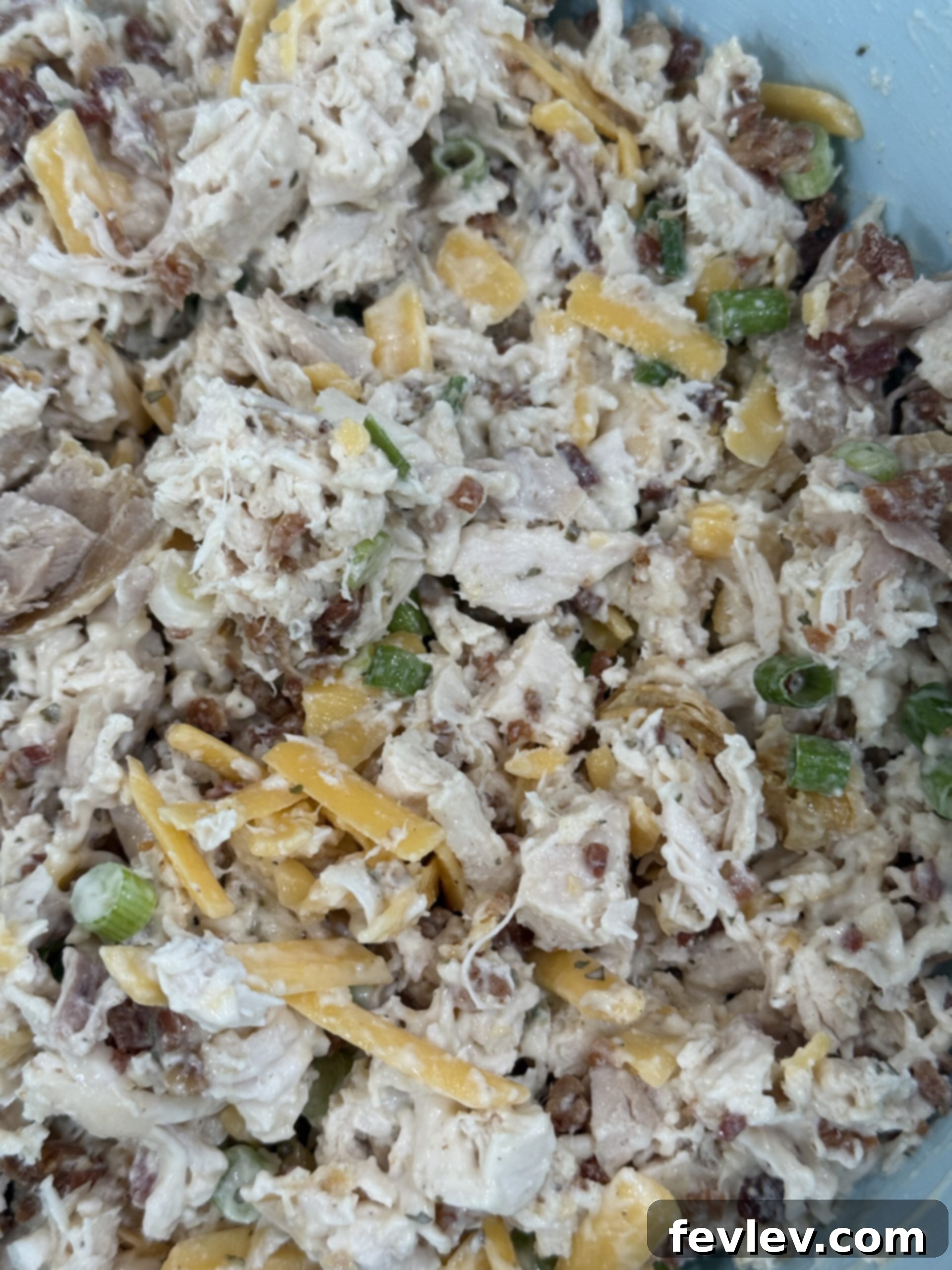 A serving of creamy Bacon Ranch Chicken Salad presented in a vibrant and appetizing way.