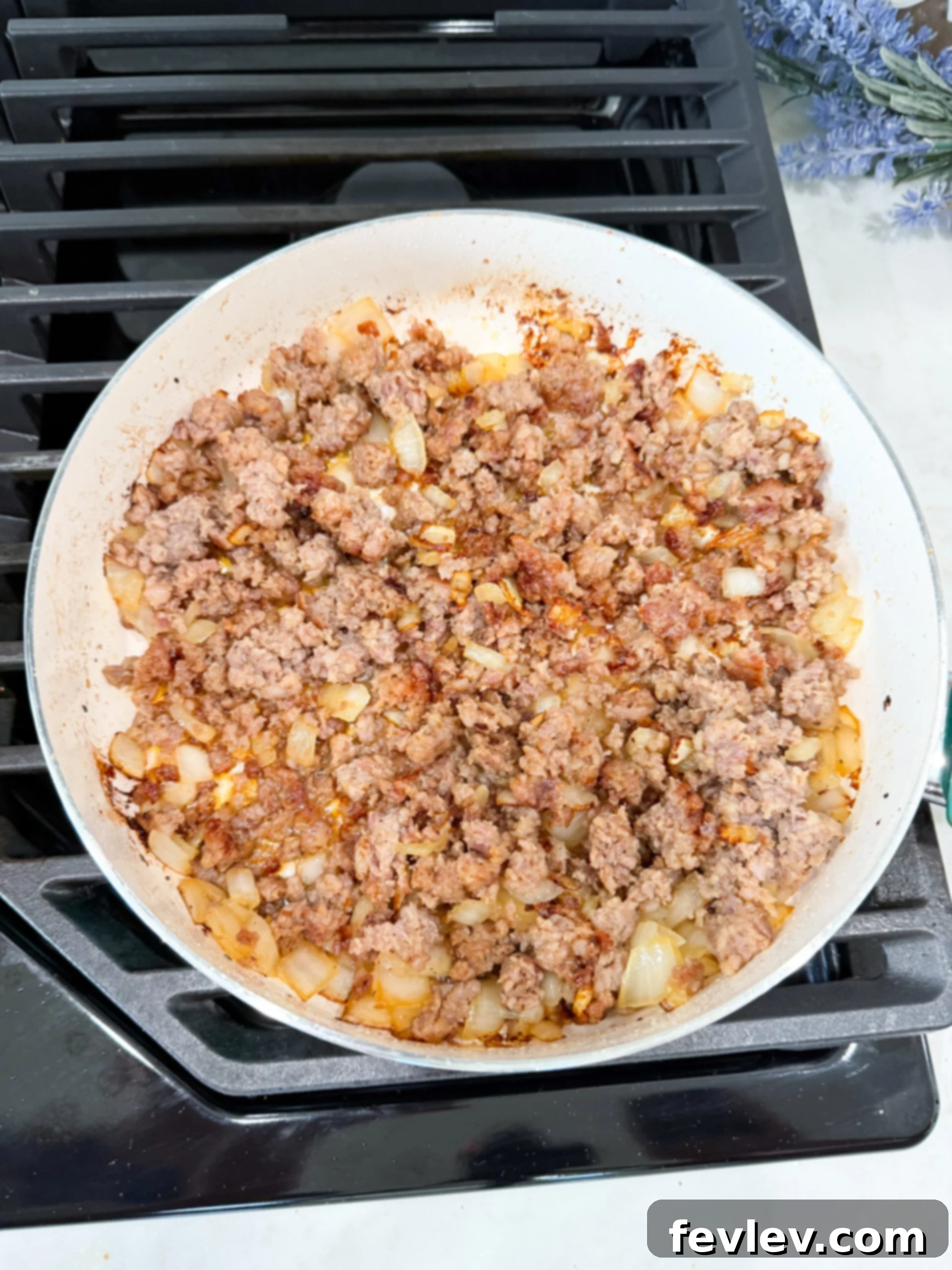 Creamy Tuscan Sausage Potato Kale Casserole 6 Italian sausage and onions browned in a skillet add bold, savory flavor to Zuppa Toscana Casserole—comfort food at its best.