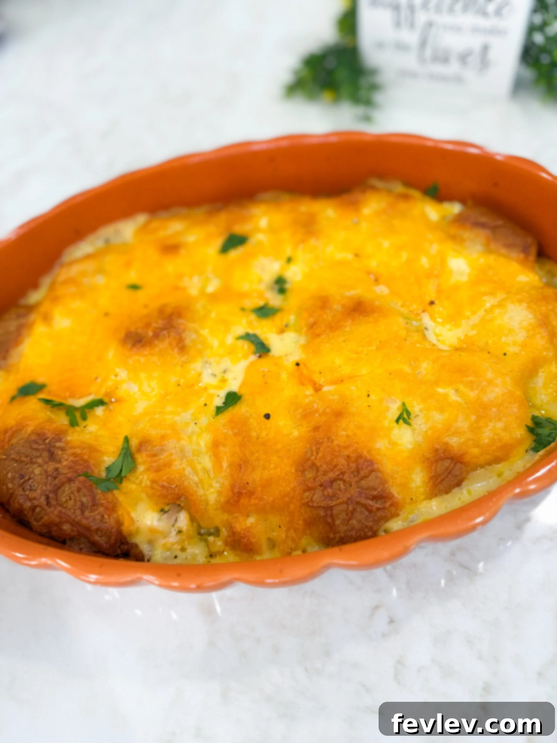 Cheesy chicken crescent roll casserole baked golden in dish