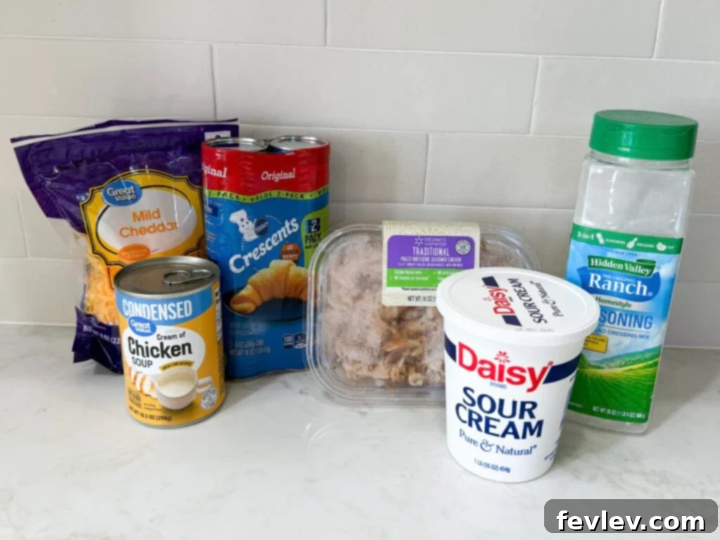 Ingredients for cheesy chicken crescent roll casserole on a counter
