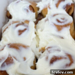 Crescent roll cinnamon rolls baked with cream cheese frosting, a quick and delicious breakfast or dessert.