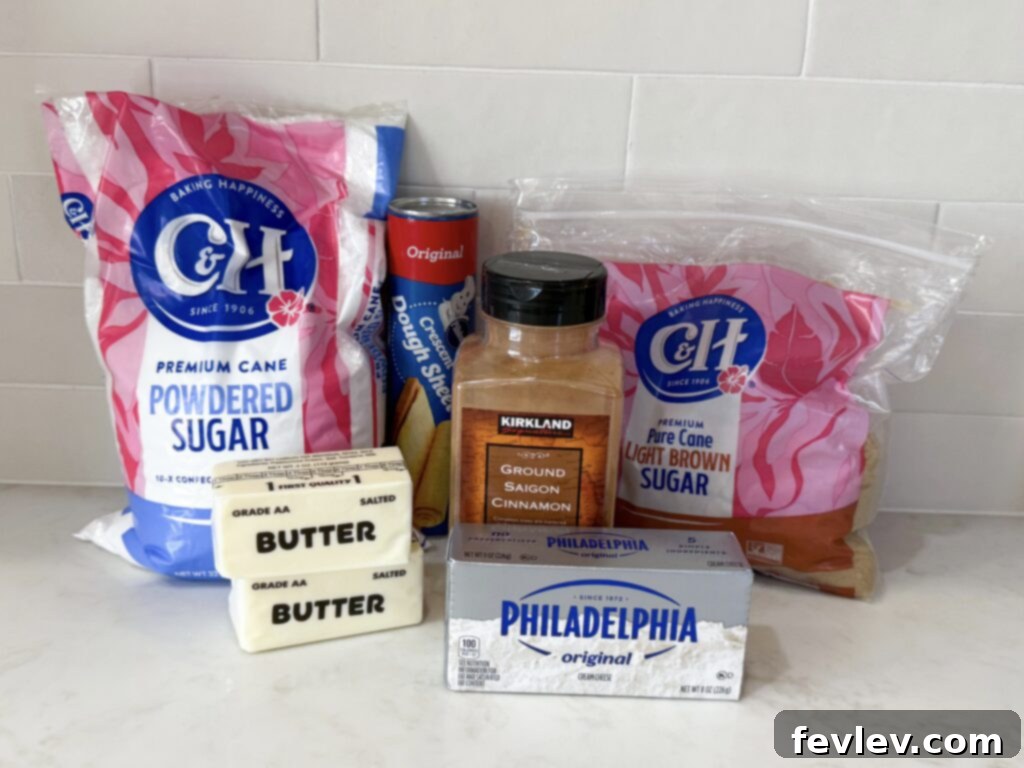 All ingredients for quick crescent roll cinnamon rolls laid out on a kitchen counter.