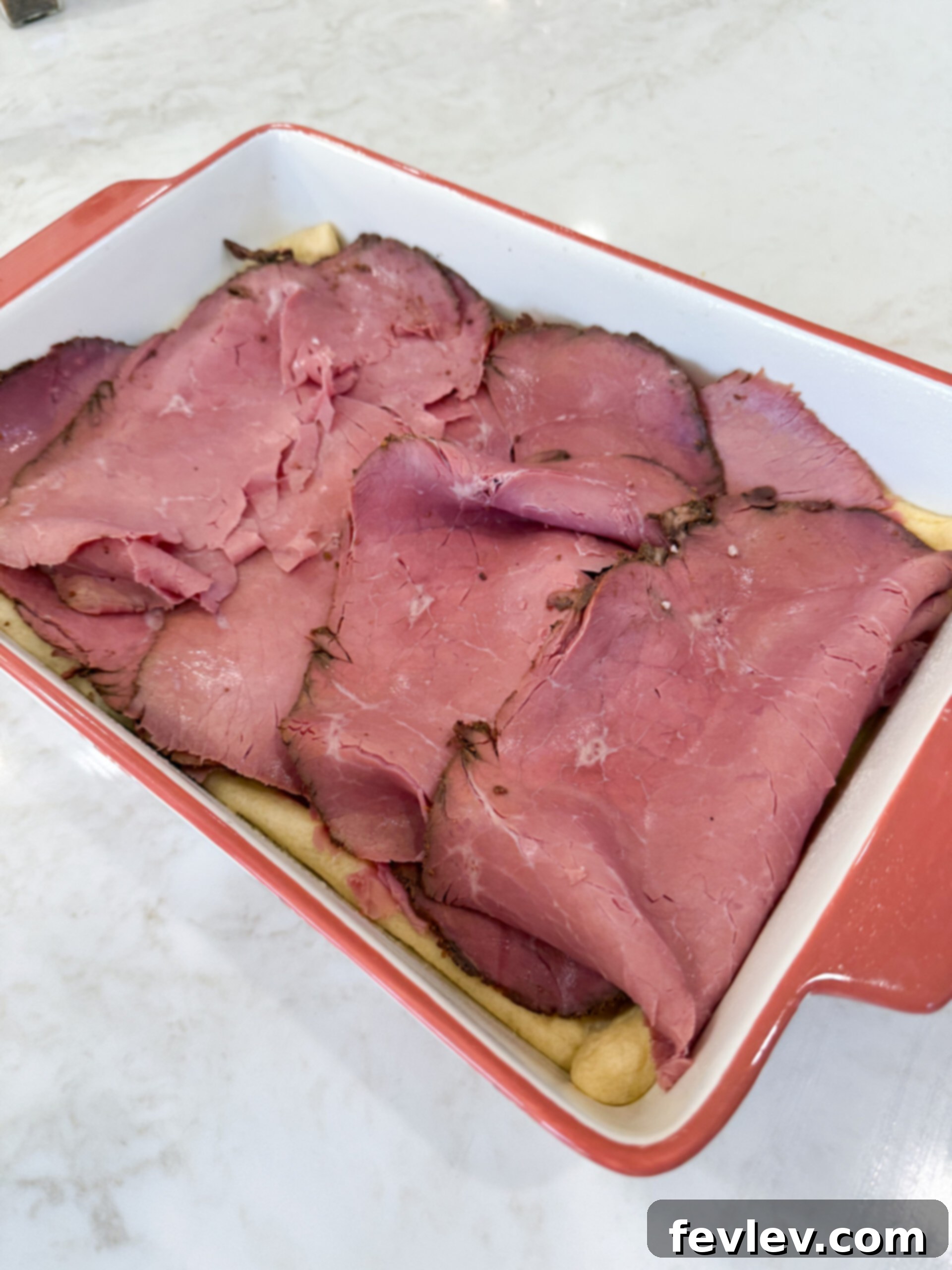 Pastrami Crescent Melt 6 Layers of Swiss cheese and pastrami on the pre-baked crescent dough.