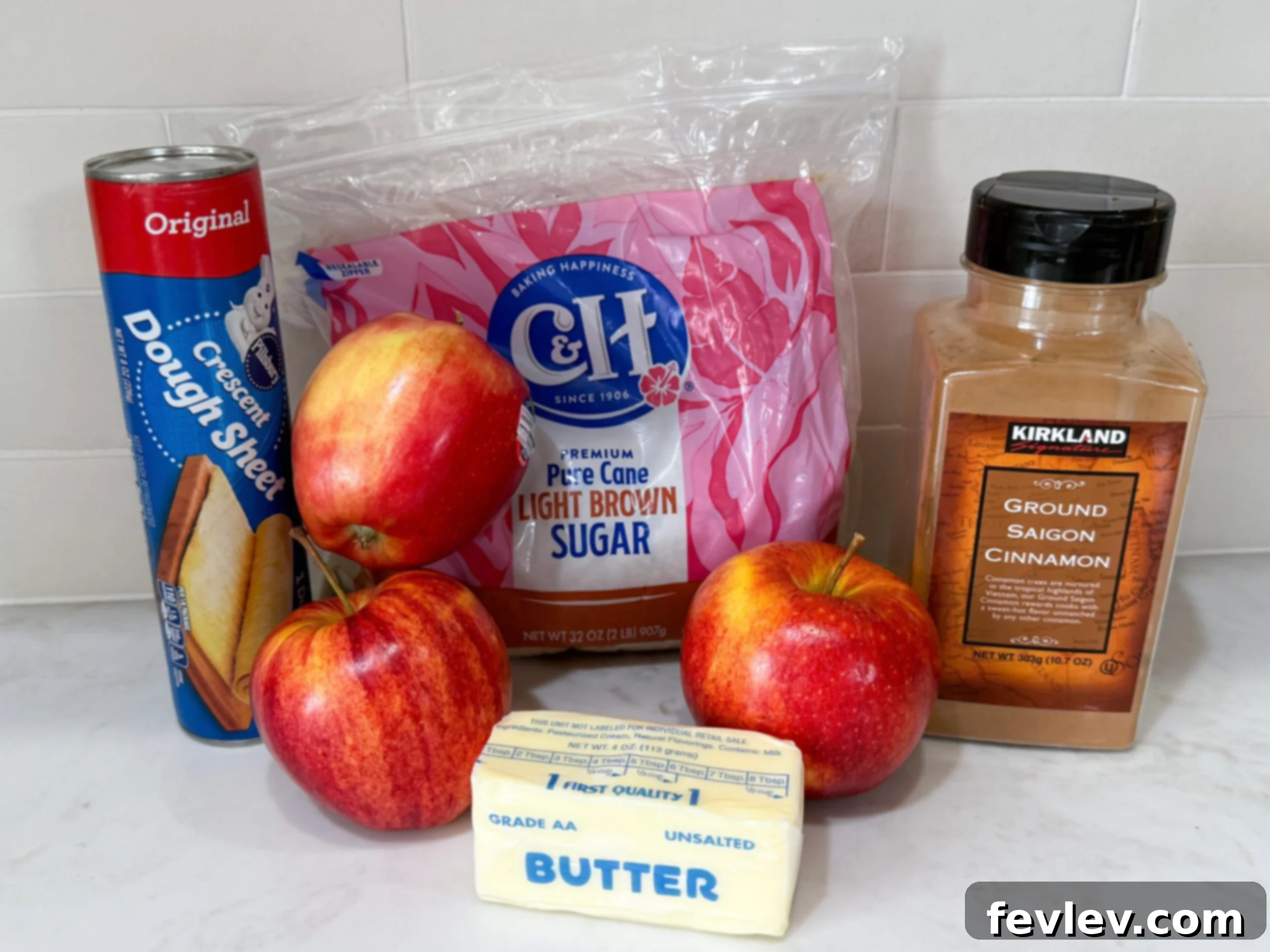 Ingredients for apple crescent donuts on counter