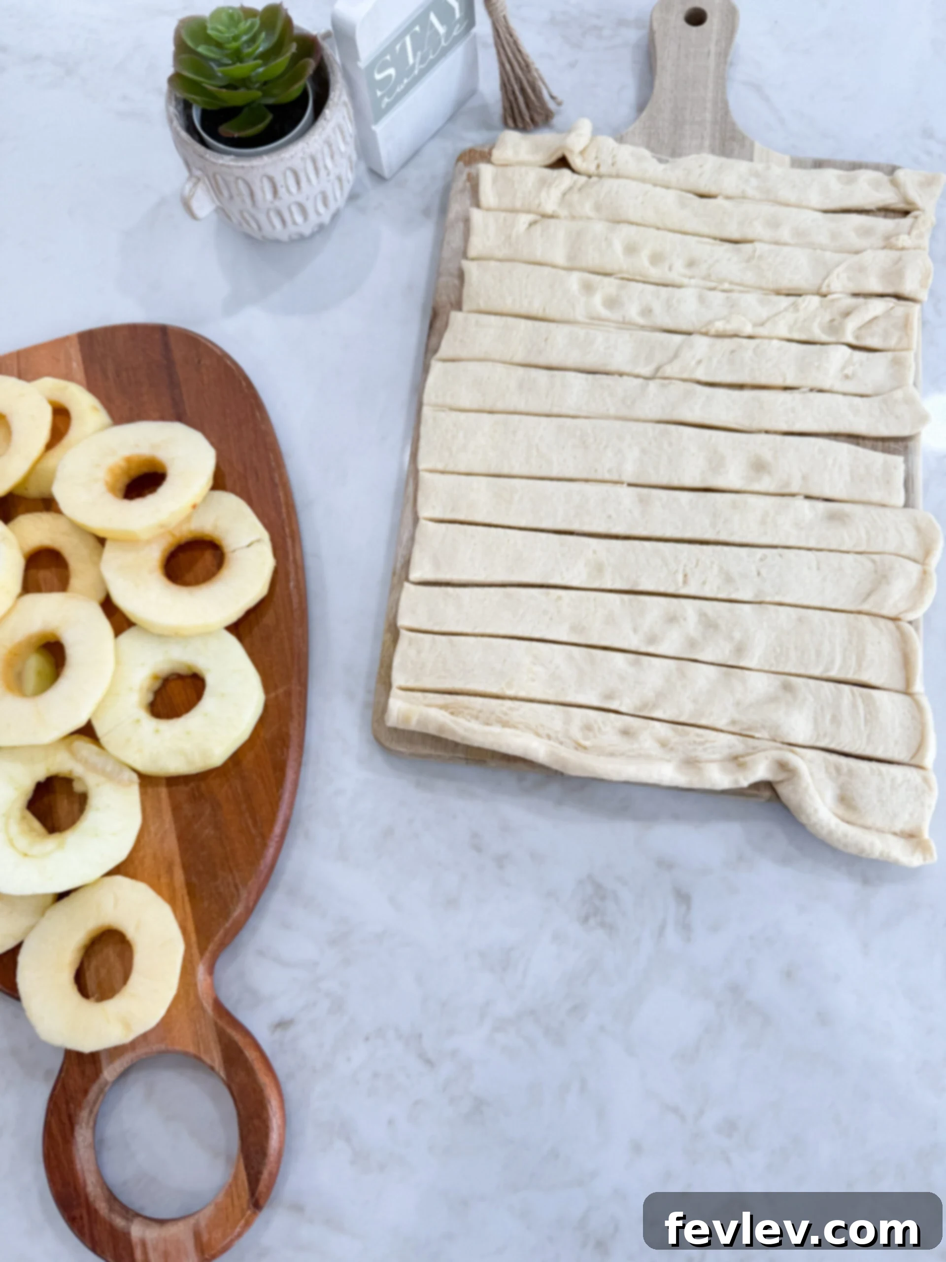 Unrolled crescent dough, cut into thin strips on the counter