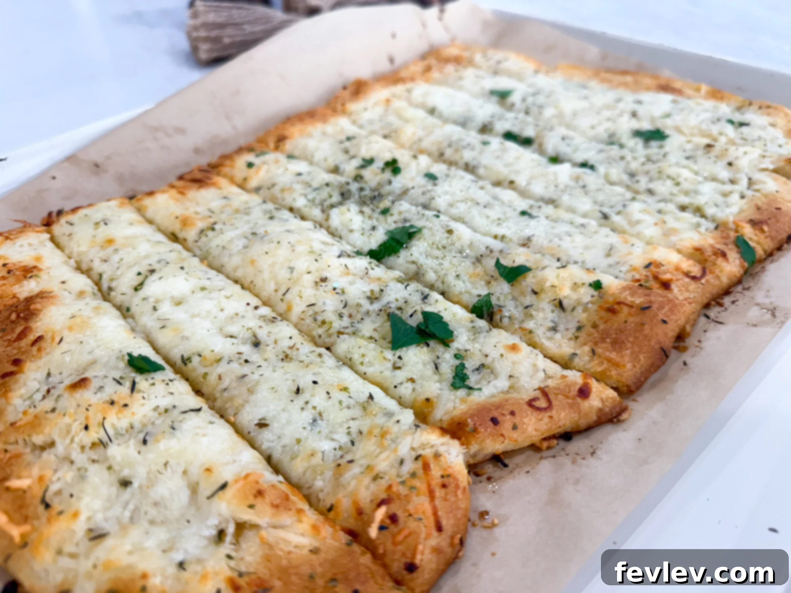 Pillowy Cheesy Garlic Crescent Bread 7 Golden baked cheesy garlic bread made with crescent dough on sheet pan