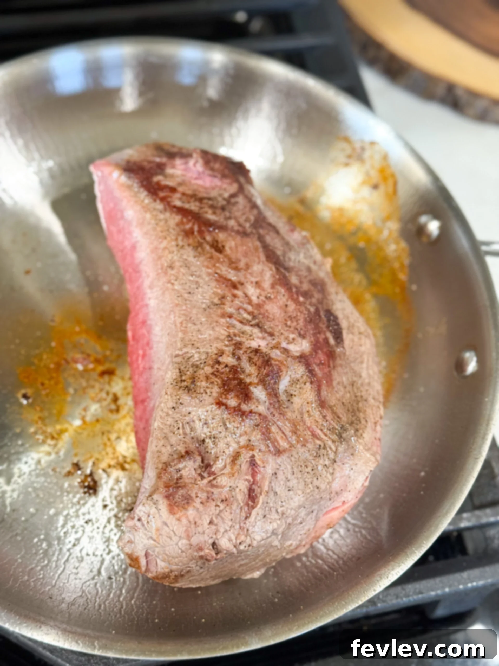Tender & Creamy Slow Cooker Beef Stroganoff 6 Searing beef roast in a hot skillet to develop rich flavor before slow cooking