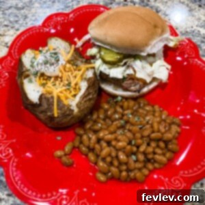 Delicious and healthy Spinach Feta Turkey Burger, served on a bun with fresh toppings