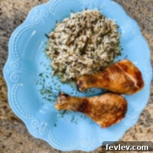 Crispy baked chicken drumsticks on a sheet pan, perfectly seasoned and golden brown.