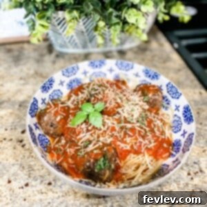 Delicious homemade meatballs simmering in sauce, ready to be served