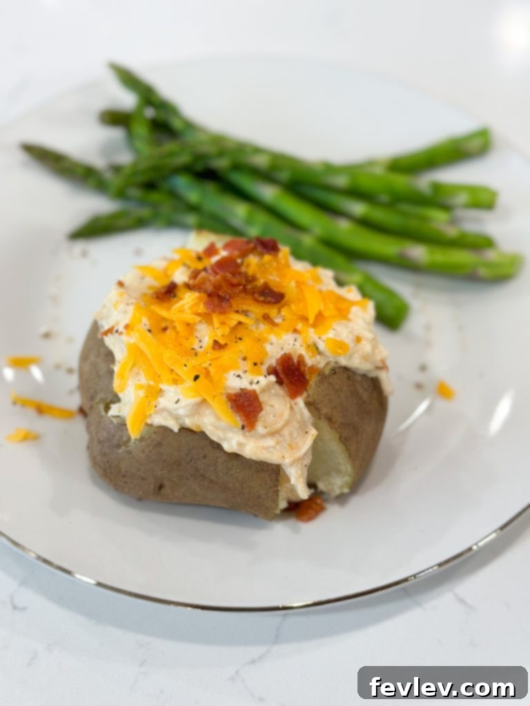 Slow cooker crack chicken dinner served on a plate.
