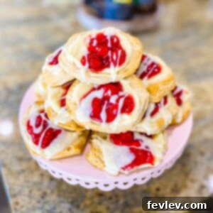 Delicious Cherry Danish pastries with a sweet glaze, perfect for breakfast or brunch.