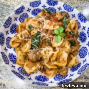 Delicious Sausage One-Pot Tortellini served in a skillet