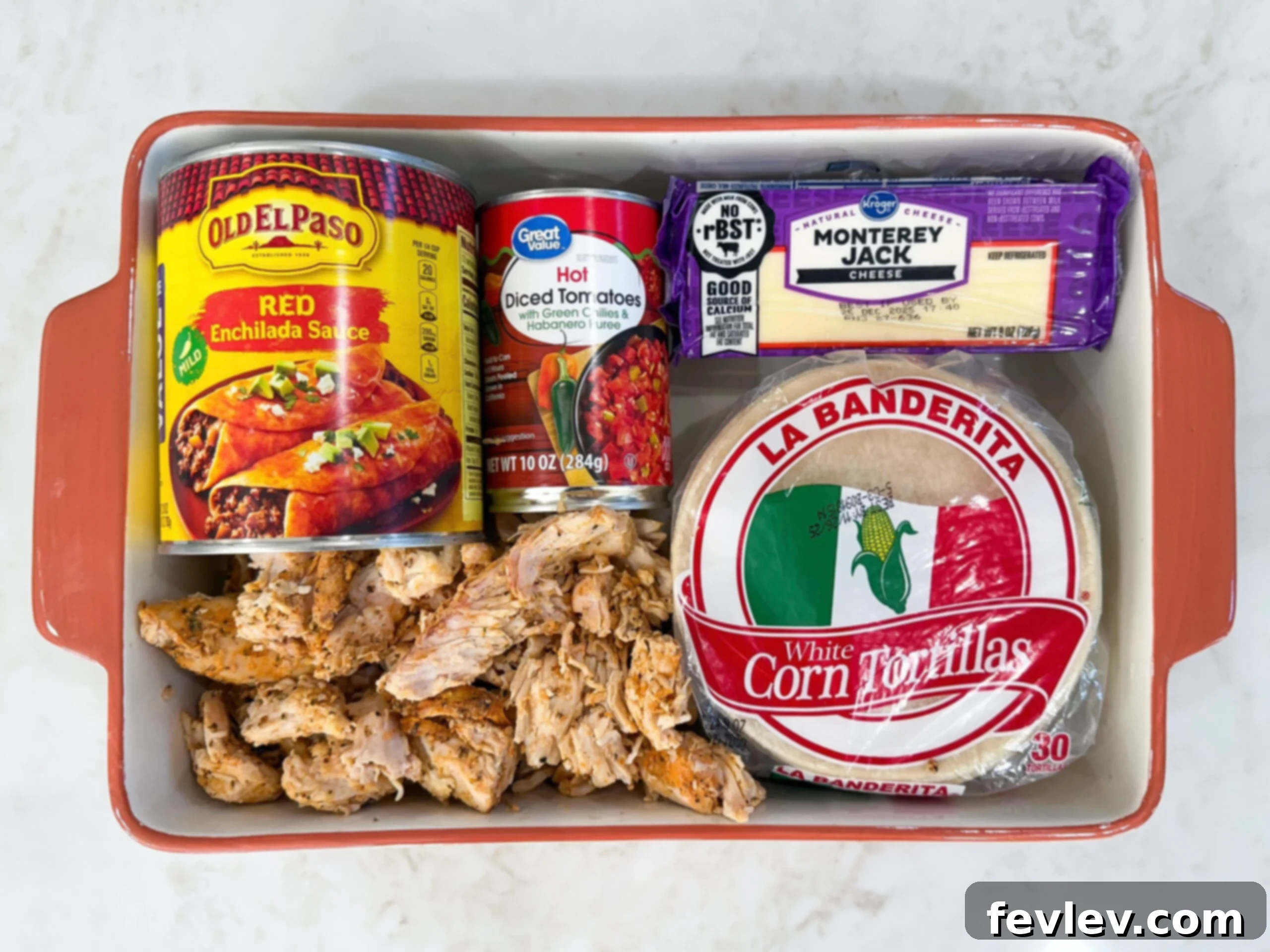 Red Chili Chicken Enchiladas 5 Ingredients for red chili chicken enchiladas in casserole dish