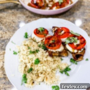 Delicious Caprese Chicken garnished with fresh basil
