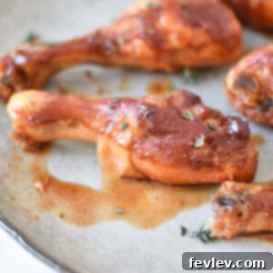 Delicious Slow Cooker BBQ Chicken Drumsticks on a plate