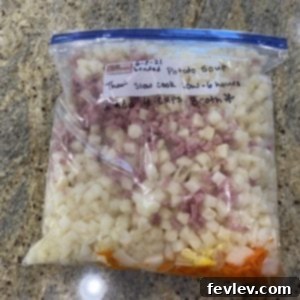 Creamy Crockpot Ham and Potato Soup, a hearty and easy slow cooker meal.