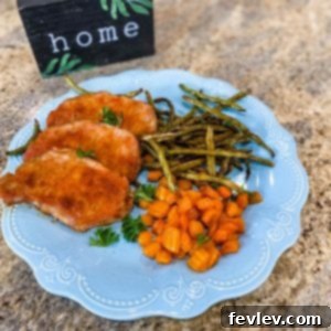 Delicious Smokie Pork Chops with roasted carrots and green beans