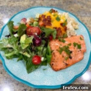Perfectly grilled salmon fillet with a tangy garlic marinade