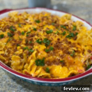 A mouth-watering image of Chicken BBQ Ranch Casserole, freshly baked and topped with melted cheese.