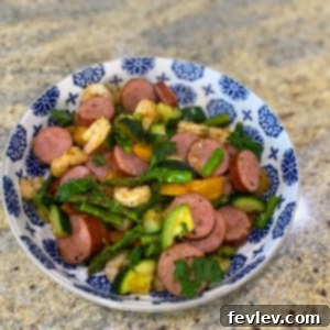 Delicious One-Pan Cajun Sausage, Shrimp, and Veggies Skillet, cooked and ready to serve