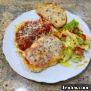 Crispy Oven Baked Chicken Parmesan with marinara and melted mozzarella